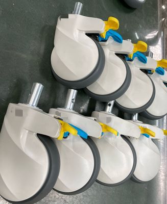 Νέα 5inch ιατρική κρεβατιών τροχίσκων διάμετρος 28 δυτών ελέγχου ροδών κεντρική τροχίσκος με το φρένο